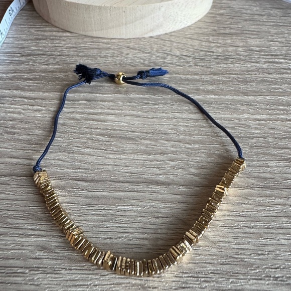 Jewelry - Gold Beaded Bracelet with Blue Cord